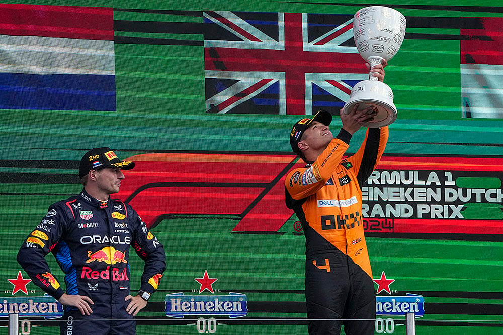 | Photo: AP/Peter Dejong : Dutch Grand Prix 2024: McLaren driver Lando Norris of Britain celebrates after winning the Formula One race